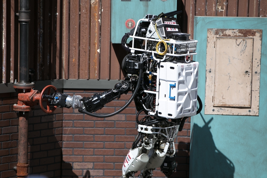 MIT's Atlas robot works on a valve task at the DARPA Robotics Challenge.