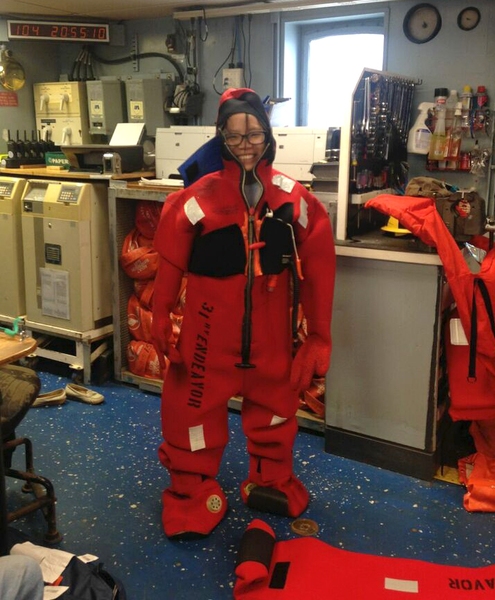 Ruby Fu dons protective gear aboard the U.S. Research Vessel Endeavor.