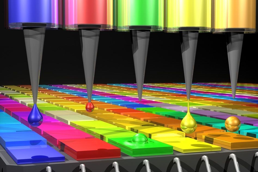 In this illustration, the Quantum Dot (QD) spectrometer device is printing QD filters — a key fabrication step. Other spectrometer approaches have complicated systems in order to create the optical structures needed. Here in the QD spectrometer approach, the optical structure — QD filters — are generated by printing liquid droplets. This approach is unique and advantageous in terms of flexi...
