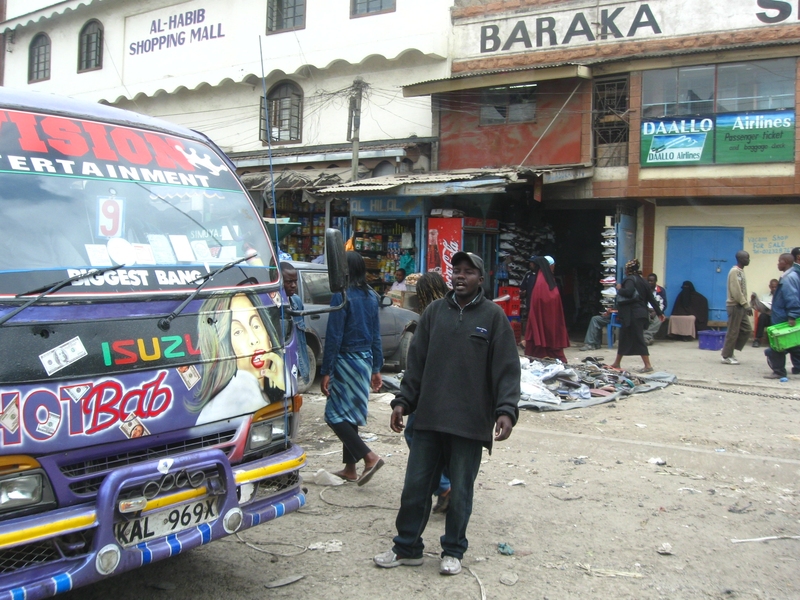 Nairobi and other cities in the developing world rely on informal networks of minivans and buses, such as the Nairobi matatu van at left, to bring laborers to work and goods to market. 