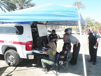 Firefighters at a mobile field site can communicate via NICS with the incident command center. 