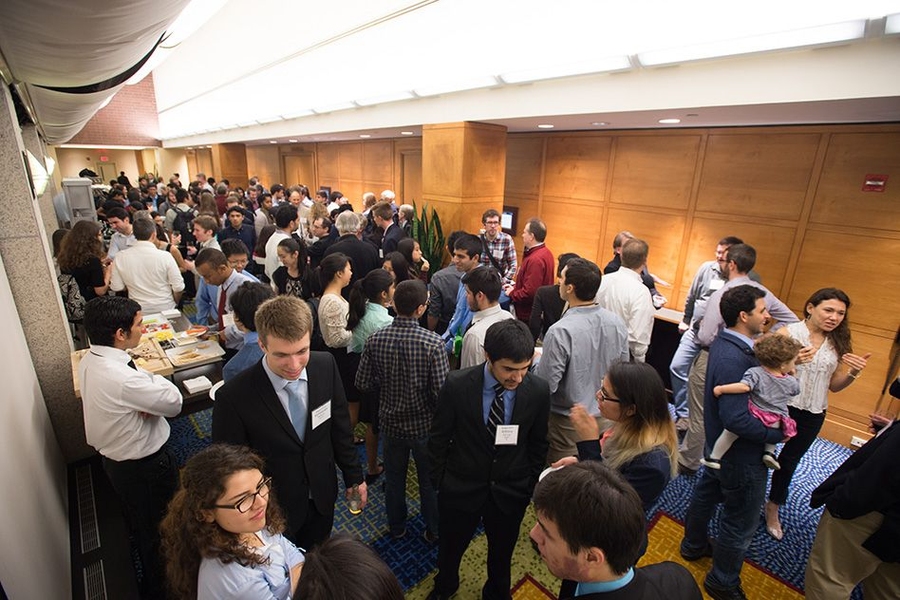 Students gathered at a reception after the SuperUROP Research Preview.
