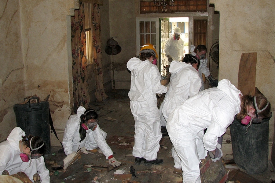 During a Spring Break Field Experience, Terrascopers work to help restore a New Orleans house flooded during Hurricane Katrina
