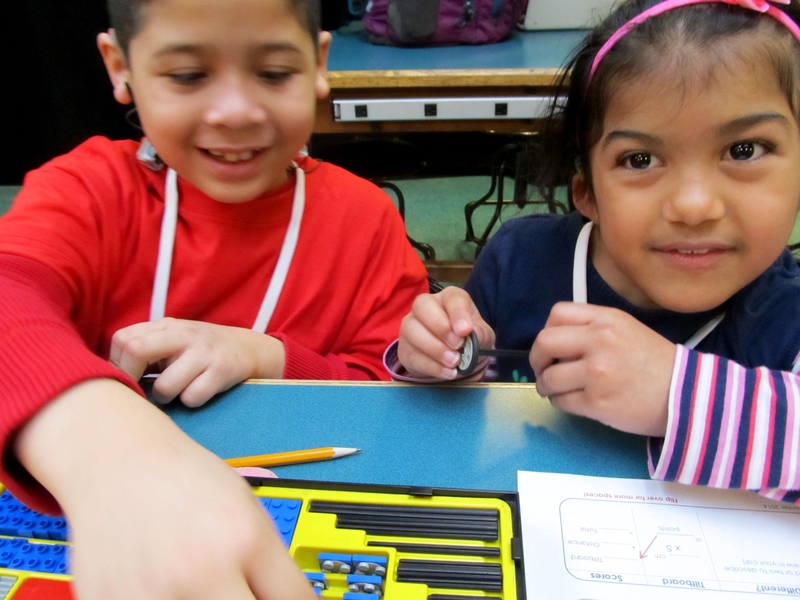 Students select the Lego parts needed to build their car. 