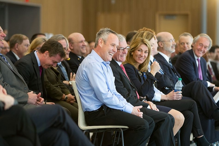 The crowd reacts to remarks by Reif.
