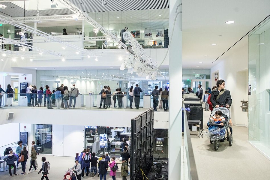 Crowds tour the Media Lab during MIT’s open house.