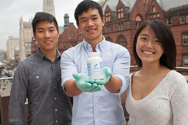 Kevin Tyan (left), Jason Kang (center), and Katherine Jin of Columbia University are the $10,000 Lemelson-MIT “Cure it!” Undergraduate Winners for their invention Highlight, a powdered additive for disinfectants that greatly improves decontamination during epidemic outbreaks and for daily use by hospitals, laboratories, first responders, and government agencies. 
