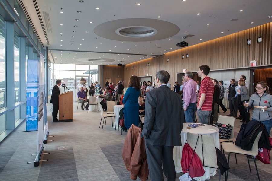 During a closing reception held in the Samberg Conference Center, Executive Vice President and Treasurer Israel Ruiz (pictured, speaking) announced three new Institute initiatives that aim, he said, "to further strengthen the ties between MIT and its host community.” 
