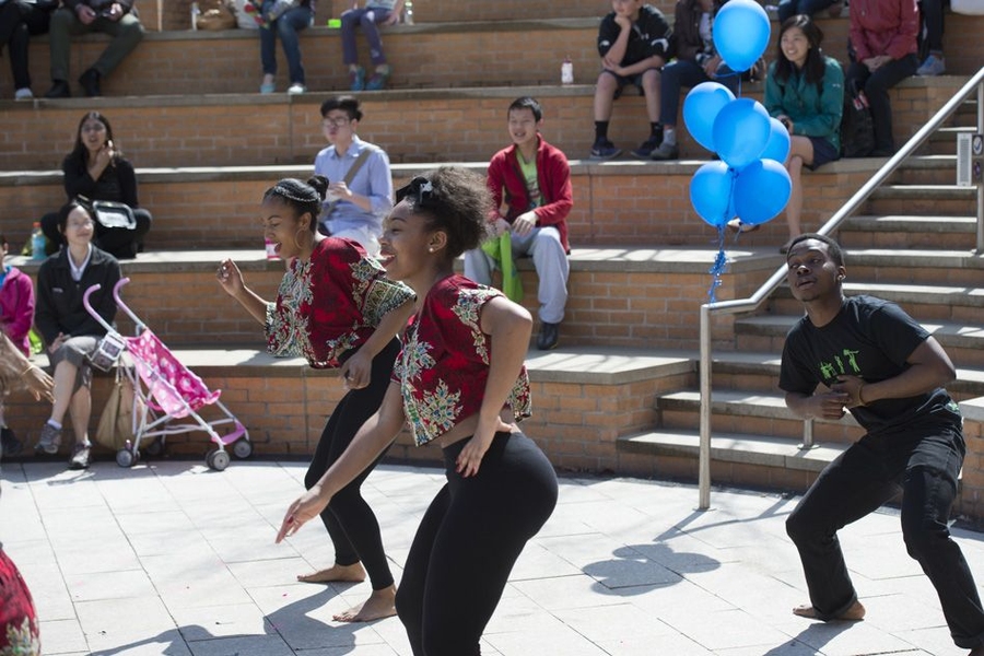 An African dance group performs for visitors at the Stata Center. 