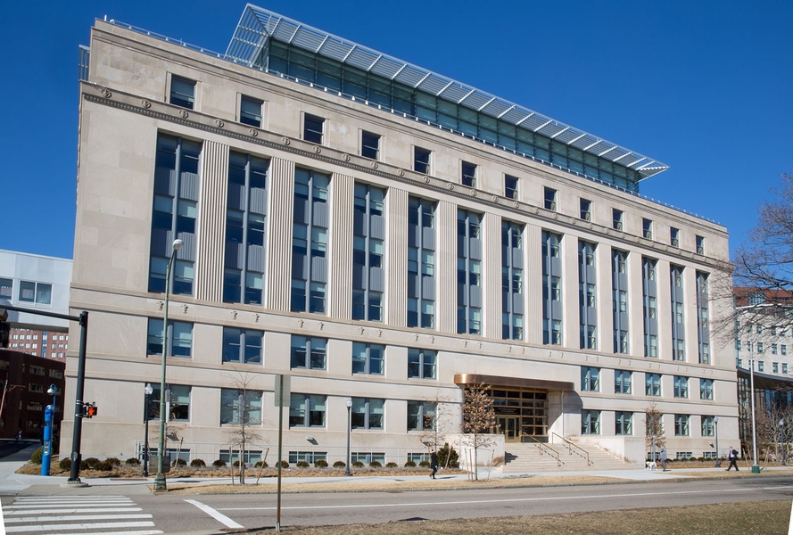 The E52 Morris and Sophie Chang Building, which is in the Streamline Moderne style, was designed in 1938 by Shreve, Lamb, and Harmon, the architects of the Empire State Building in New York City. 