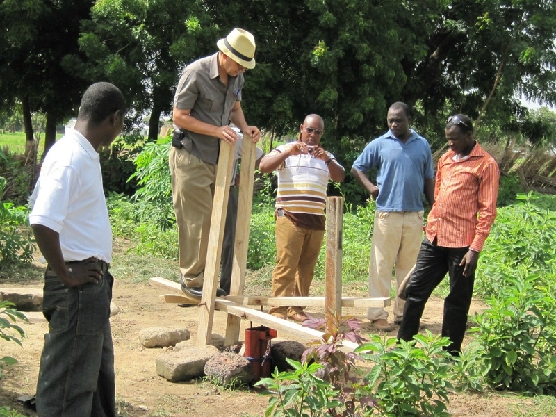 Newly appointed MIT D-Lab executive director Bob Nanes (second from left) demonstrates a treadle pump in Ghana. For 25 years, Nanes worked with iDE (formerly International Development Enterprises), an international non-profit dedicated to ending poverty in the developing world through helping farm families access the tools and knowledge they need to increase their income. Among other roles, Nanes ...