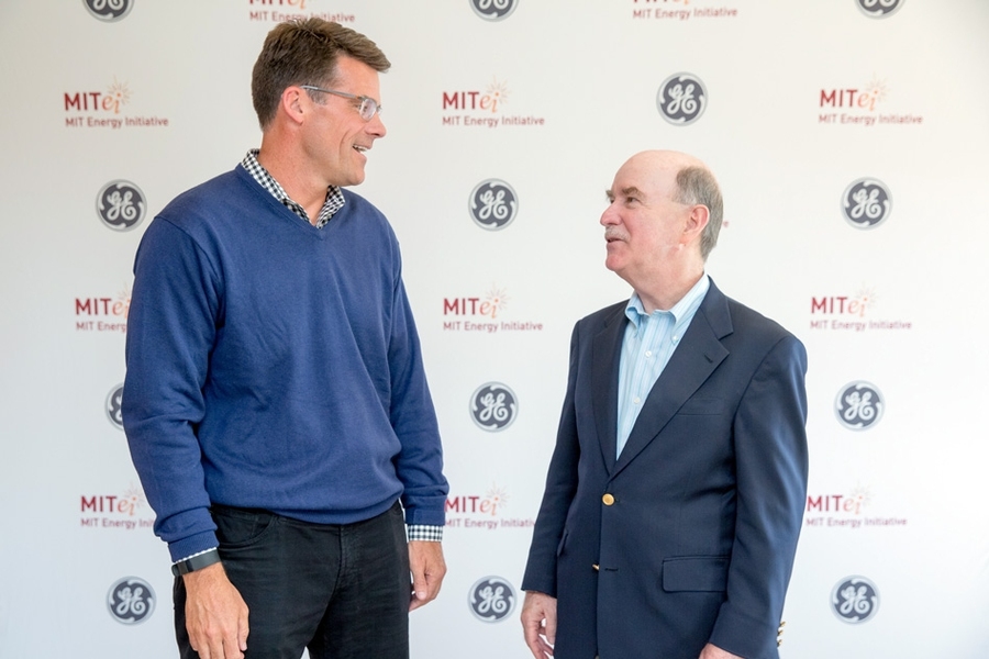 Steve Bolze, GE Power president and CEO, and Robert Armstrong, director of the MIT Energy Initiative (MITEI), celebrate GE’s new membership in MITEI and participation in four of MITEI’s Low-Carbon Energy Centers. 