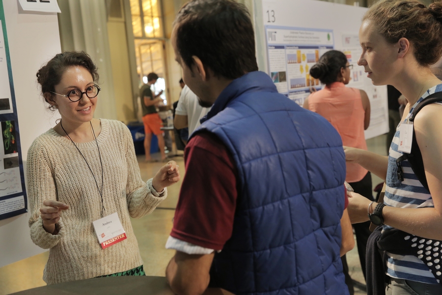 Master's student Andrea Lehn (left) presents her work to Mehran Dibaji (center) and Liz Strong.
