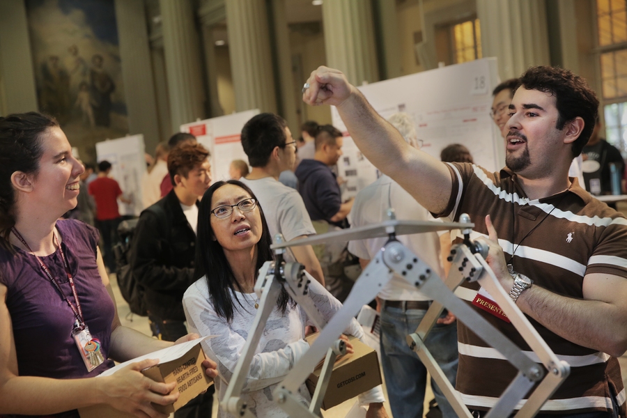 The annual Mechanical Engineering Research Exhibition (MERE) is a chance to view and discuss the latest research by MechE graduate students and postdocs; network with MechE researchers, faculty, and fellow alumni; and establish new and innovative collaborations. At the 2016 exhibition, MechE staff members Emilie Heilig (left) and Yvette Lai (center) listen to Daniel Gonzalez's presentation on his ...