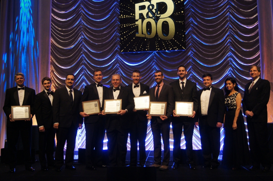 Eric Evans (far left), director of MIT Lincoln Laboratory, who accepted the R&D 100 Award for the Broadband Magnetometry and Temperature Sensing with a Light-Trapping Diamond Waveguide on behalf of inventor Danielle Braje, joins the other Lincoln Laboratory attendees at the R&D 100 Conference banquet. The group represents the Laboratory's nine R&D 100 Award finalists, and includes principal invest...