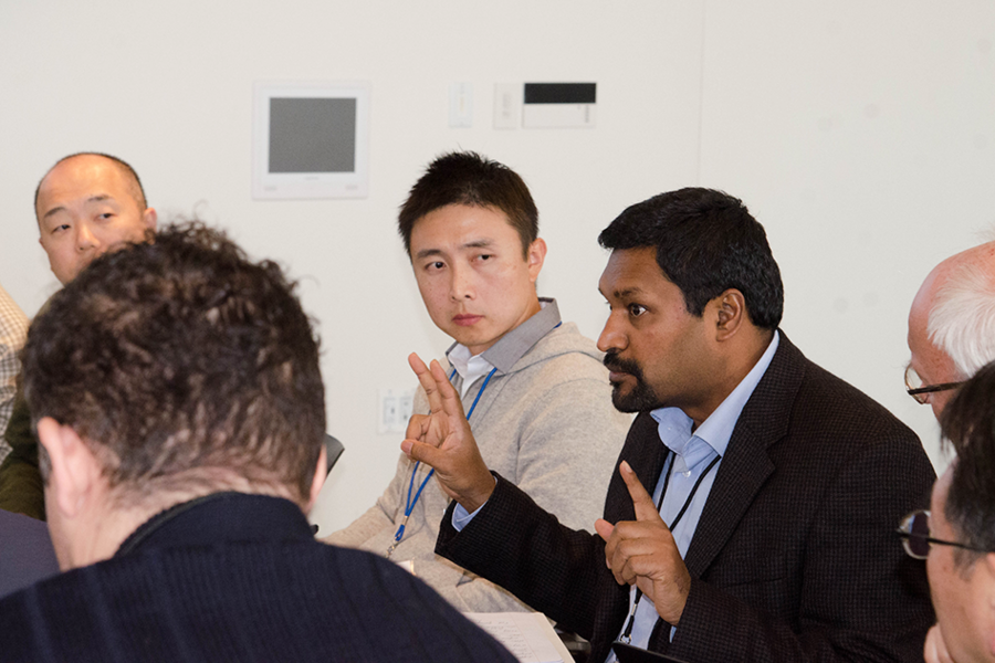 AIM Photonics fall meeting attendees participate in a discussion at MIT.
