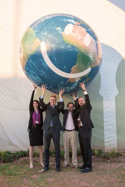 Working on climate solutions for the world: (left to right) Laur Hesse Fisher, Climate CoLab project manager; Andrew Jones MS '97, co-director of Climate Interactive; PhD candidate Michael Davidson; and Travis Franck SM '05 PhD '09, Climate Interactive program director and MIT research affiliate