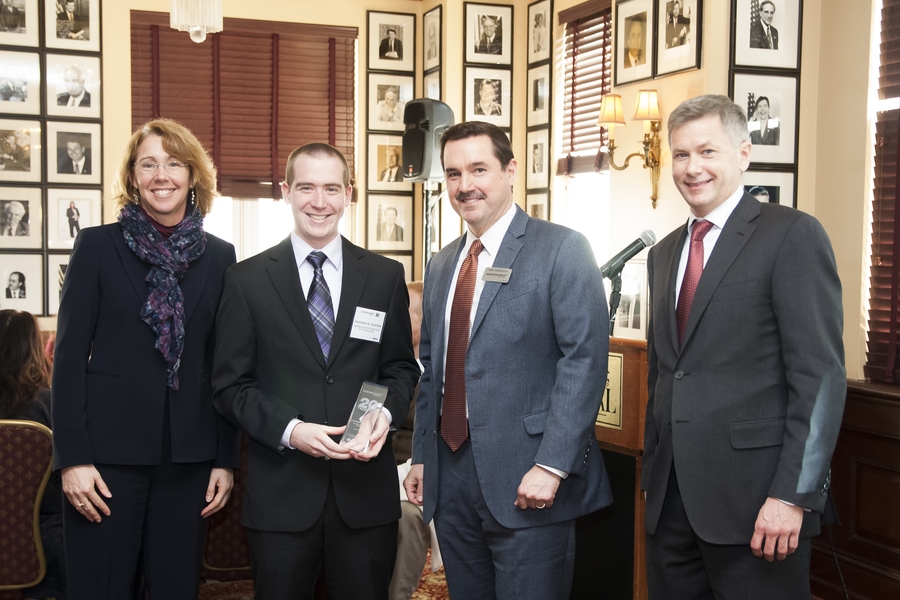 MIT graduate student Alexander Feldstein, pictured second from left, was honored as one of the 2017 “20 Twenties” during a ceremony held in Washington. Pictured, left to right: Sandra H. Magnus, executive director of the American Institute of Aeronautics and Astronautics; Alexander Feldstein; Greg Hamilton, president of the Aviation Week Network; and Joe Anselmo, editor-in-chief of <i>Aviation...