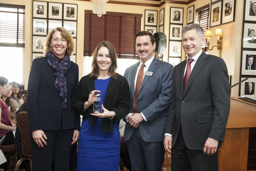 Kristen Railey is presented with the Aviation Week Network’s “20 Twenties” award during a ceremony held at the National Building Museum in Washington. Pictured, left to right: Sandra H. Magnus, executive director of the American Institute of Aeronautics and Astronautics; Kristen Railey; Greg Hamilton, president of the Aviation Week Network; and Joe Anselmo, editor-in-chief of <i>Aviation Wee...