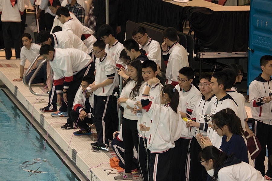 Students at the Zesiger pool wait to test their ROVs.