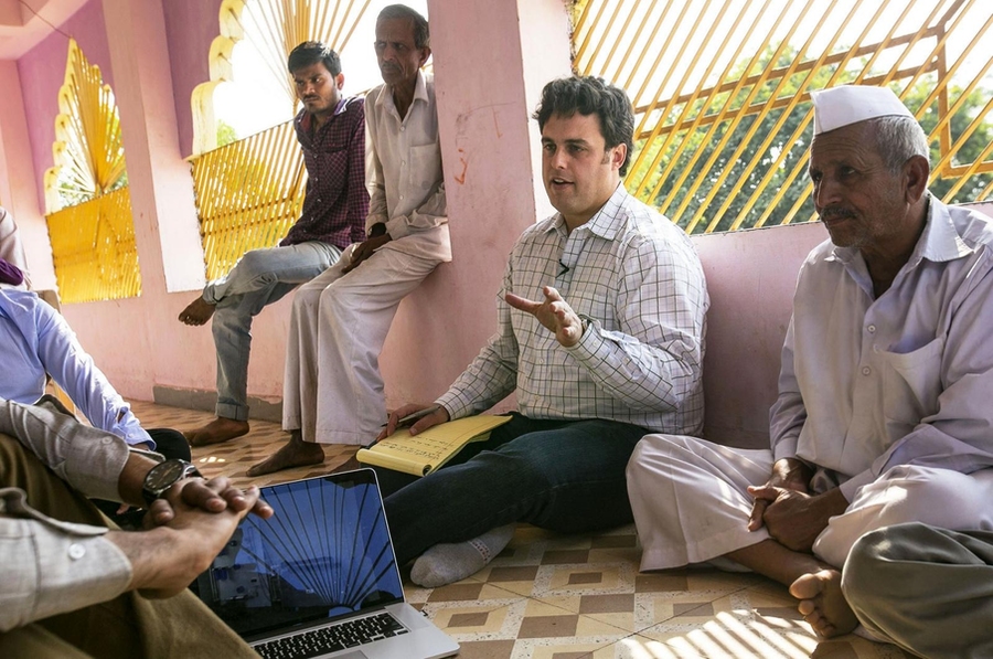 Amos Winter, assistant professor in the Department of Mechanical Engineering, speaks to individuals in India, where he has introduced assistive technologies such as a wheelchair for rugged terrain. 