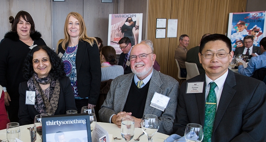 The Quarter Century Club promotes fellowship among long-term employees of the MIT community. New and old friends enjoy the induction ceremony and luncheon. Seated, l-r: Anuradha Annaswamy (Department of Mechanical Engineering), Joe Collins (QCC Board member, retired from Alumni Association), Chiping Chen (Plasma Science and Fusion Center), Standing, l-r: Joanne Hanley (Department of Electrical Eng...
