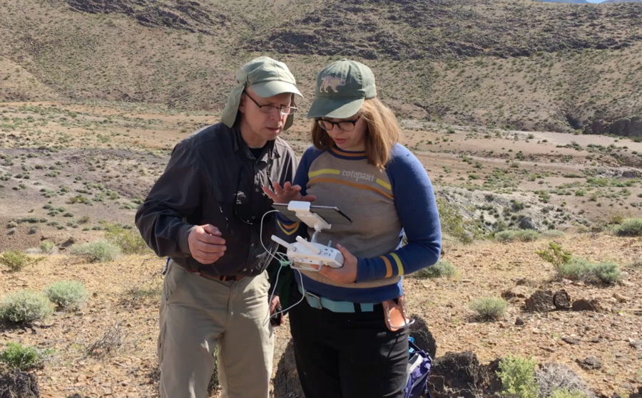 Daniel Sheehan and Marjorie Cantine confer over drone operations in Death Valley.