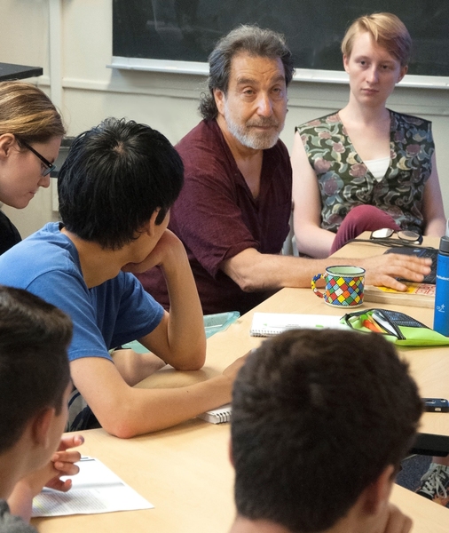 Lee Perlman (in maroon shirt) lectures on the philosophy of love at MIT. Perlman also teaches classes at Massachusetts prisons with a mix of both MIT students and prison inmates.