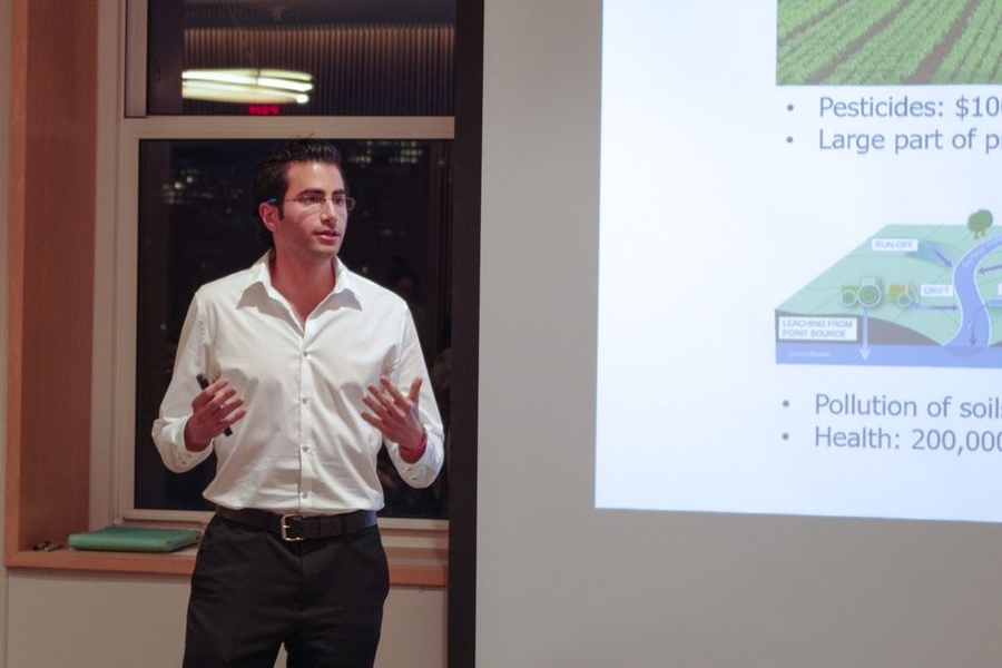 Maher Damak delivers the pitch for MIT team Ecospray, which is developing a spray that helps farmers drastically cut pesticide usage, lowering costs and reducing pollution. Ecospray won a second-place prize for $8,000.