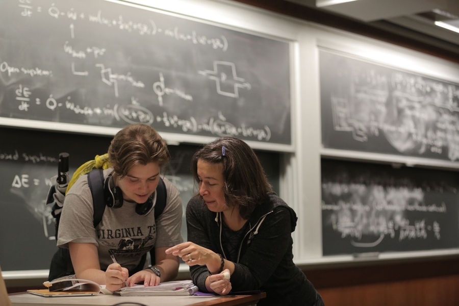 Professor Anette "Peko" Hosoi (right), associate department head in MIT's Department of Mechanical Engineering, advises a student. 