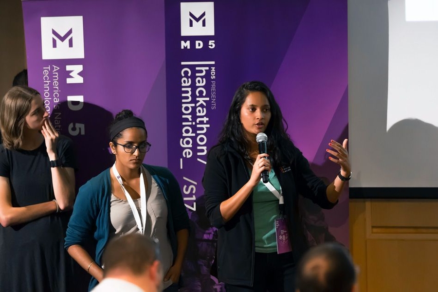 Aditi Gupta (speaking), a PhD student in the Harvard-MIT Program in Health Sciences and Technology, and her team designed a mockup of an automated triage system called VITAL, which includes a garment integrated with sensors that continuously monitor vital signs. Signals are sent to a machine-learning algorithm that determines the necessary order of care for injured soldiers.
