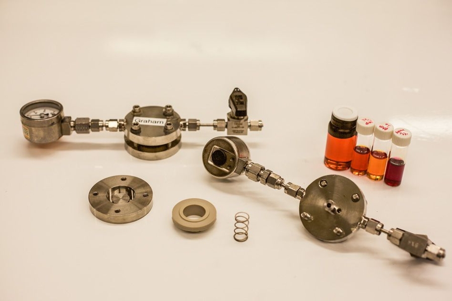 Lithium oxygen battery cell components were used for experiments in the lab.
