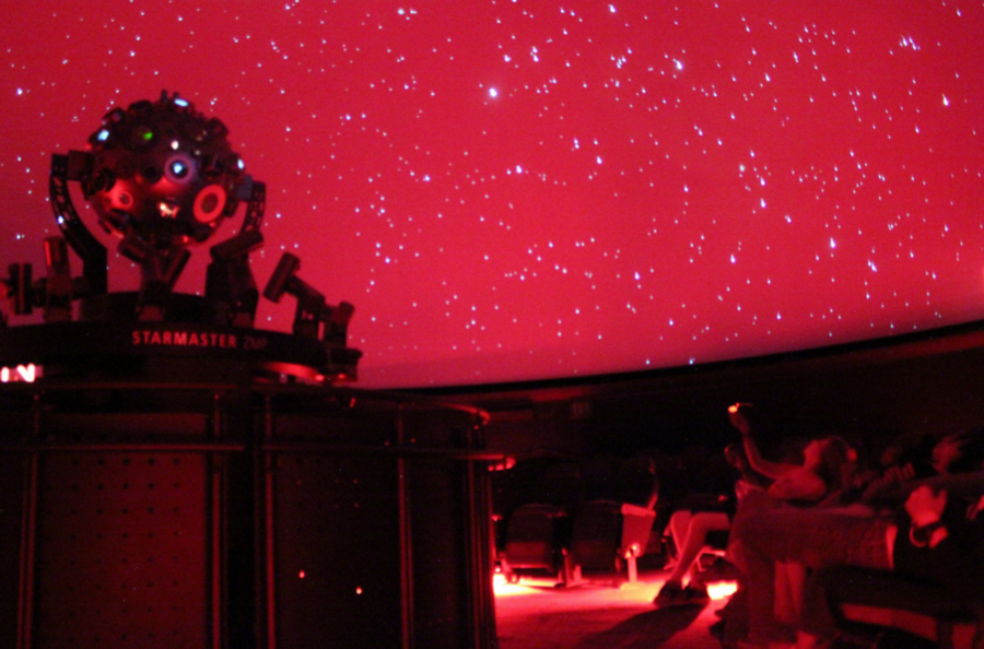 MIT Astronomy Training Camp attendees get a lesson in the night sky at the Museum of Science Boston's Charles Hayden Planetarium.