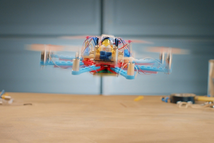 A Flybrix LEGO drone lifts off. Flybrix kits let consumers “tinker around with LEGOs, come up with a design you like, and see it fly,” says cofounder Amir Hirsch ’06, SM ’07.
