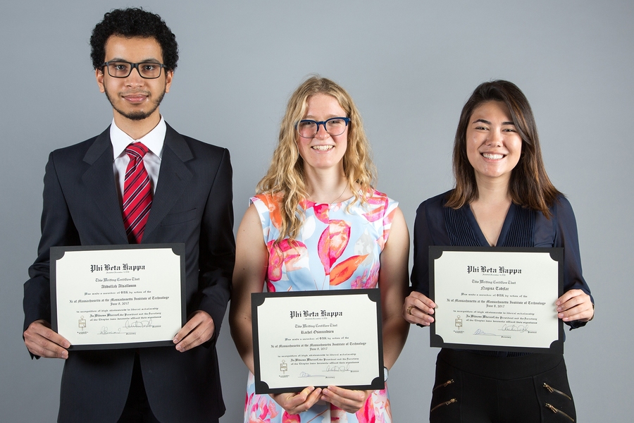 2017 Phi Beta Kappa Society inductees (l-r) Abdullah Alsalloum, Rachel Osmundsen, and Nagisa Taxifar show off their certificates of membership.