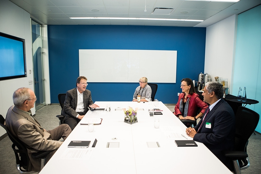 At the signing ceremony for the new collaboration, MIT President L. Rafael Reif, John Kelly of IBM, Sophie Vanderbroek, COO of IBM Research, Deborah DeSanzo, general manager of IBM Watson Health, and Anantha Chandrakasan, dean of MIT’s School of Engineering, discuss the plans for the MIT–IBM Watson AI Lab.
