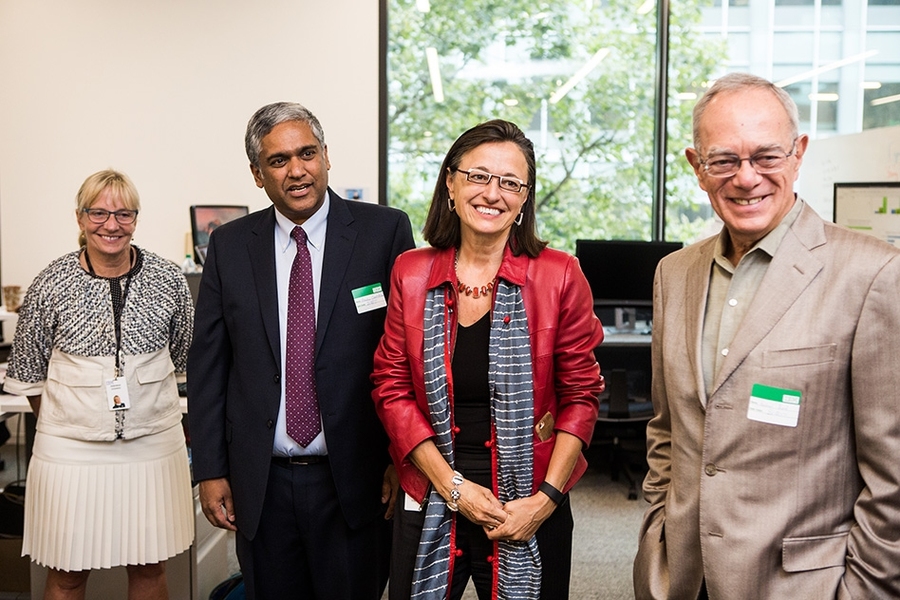 Sophie Vanderbroek of IBM, Anantha Chandrakasan of MIT, Deborah DeSanzo of IBM, and President L. Rafael Reif of MIT visit the site of the new collaborative AI Lab.
