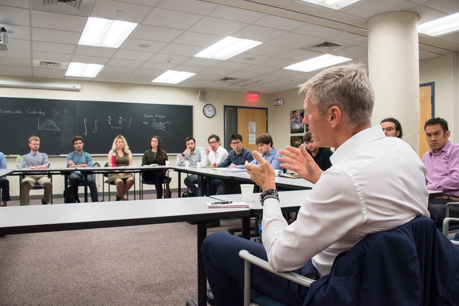 Student questions in the morning meeting with Brekelmans focused on carbon pricing, climate change, and long-range R&D planning. 
