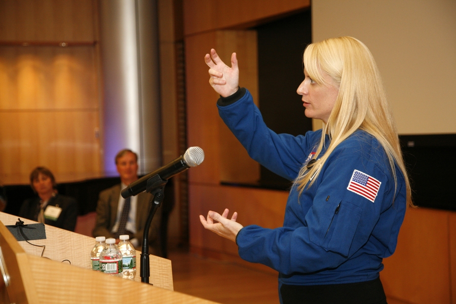 At a Whitehead Connects evening event, astronaut Kate Rubins described her path from biotechnology research to residency on the International Space Station. MIT Vice President for Research Maria Zuber (far left) and Professor David Page look on. 