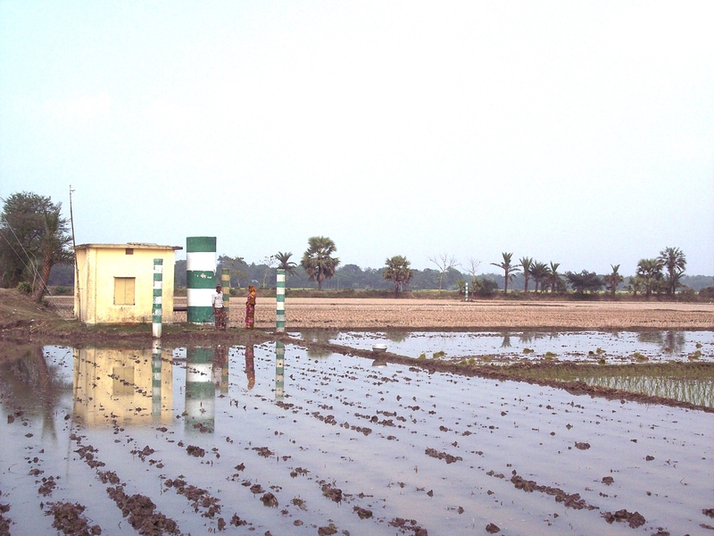 A pump house and flooded rice fields in Faridpur, Bangladesh