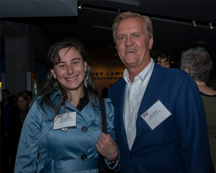 Catherine Wilka, a 2017-2018 John H. Carlson Fellow, meets benefactor John Carlson at the reception for the lecture that bears his name.