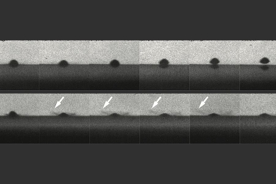 The top row of photos shows a particle that melts the surface on impact and bounces away without sticking. The bottom row shows a similar particle that does not melt and does stick to the surface. Arrows show impact sprays that look like liquid, but are actually solid particles. 
