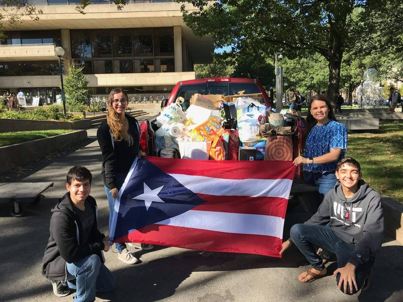 MIT students load up donations into a truck to be delivered to Puerto Rico.