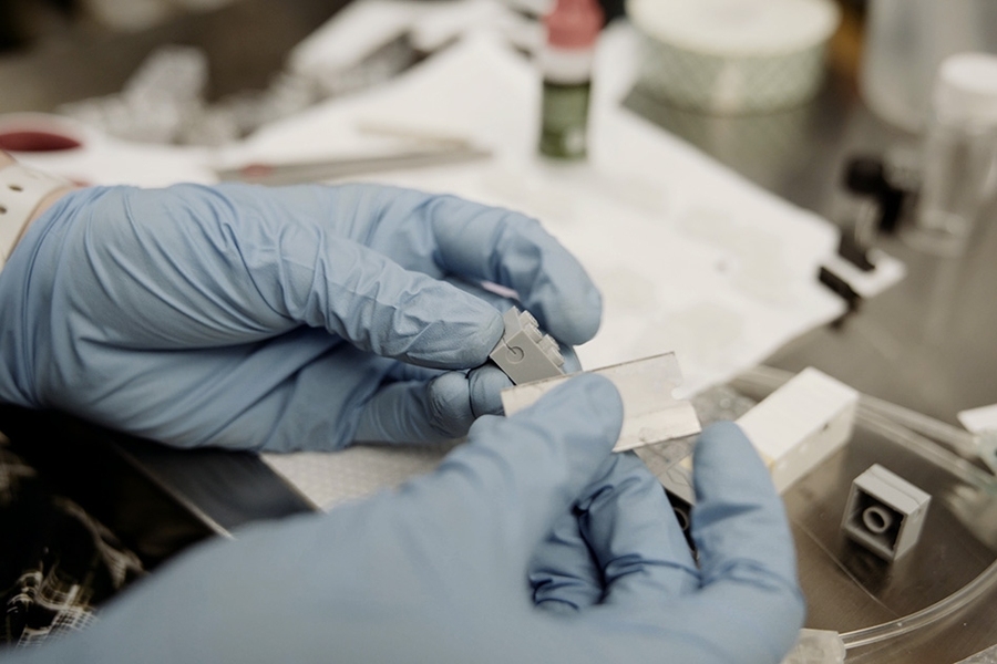 Putting the finishing touches on a fluidic brick.