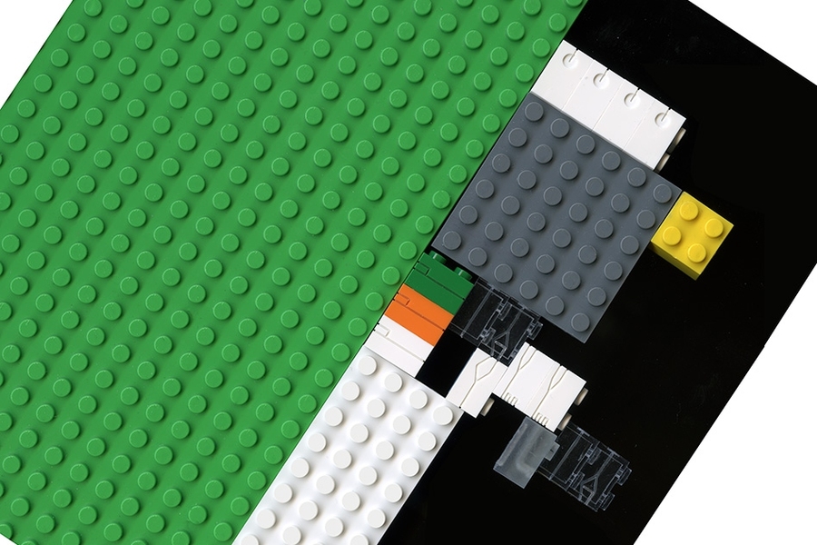 A close-up of LEGO bricks, milled with tiny fluidic channels.