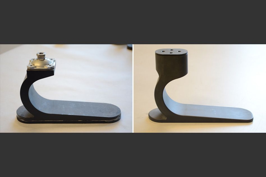 Two generations of the single-part, low-cost prosthetic foot made from nylon.