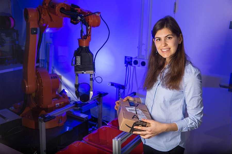 Doctoral student Maria Bauza has been exploring the notion of uncertainty when robots pick up, grasp, or push an object. “If the robot could touch the object, have a notion of tactile information, and be able to react to that information, it will have much more success," she says.
