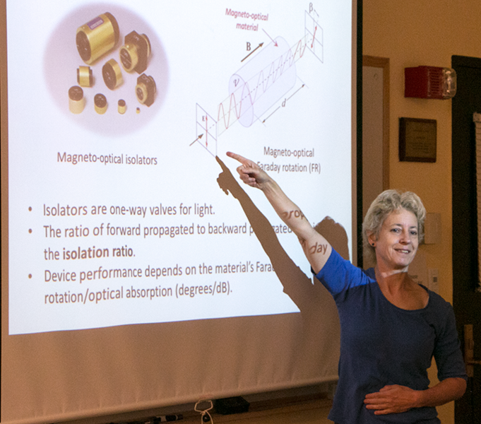 Professor Caroline A. Ross discusses isolators that combine light and magnetism to integrate photonic circuits into computer chips during a presentation to the MIT MRL Summer Scholars. 