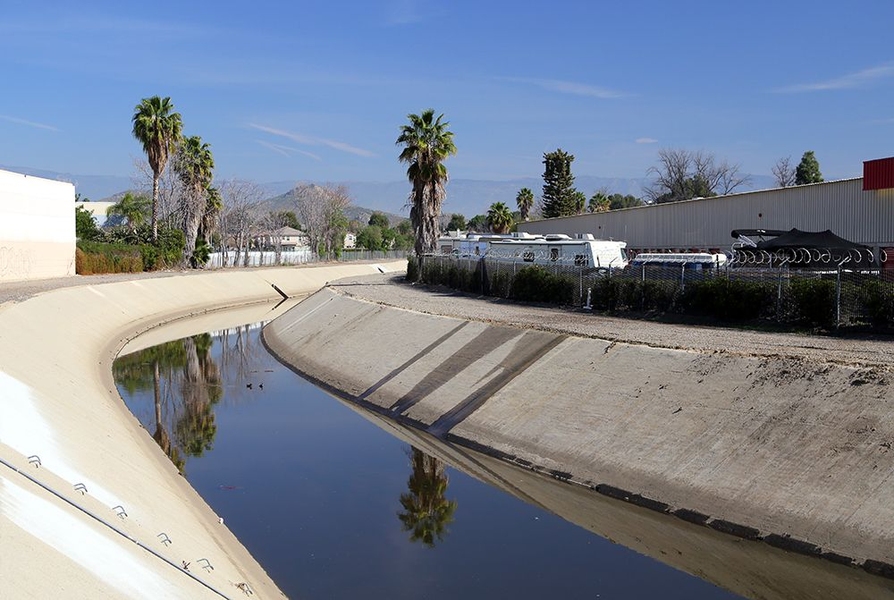 Many cities do not have adequate systems in place to handle stormwater runoff.  Paved spaces, such as this example in southern California, keep stormwater on the surface where the water picks up and carries pollutants to nearby bodies of water, often including the local water supply.  
