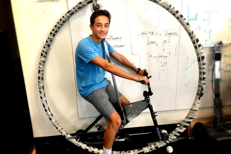 Adam Hung of Team Monowheel demonstrated the one-wheeled single-track vehicle his team built in EDW.
